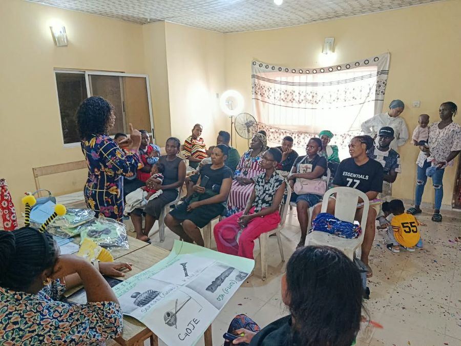 Parents listening during an orientation session at the school