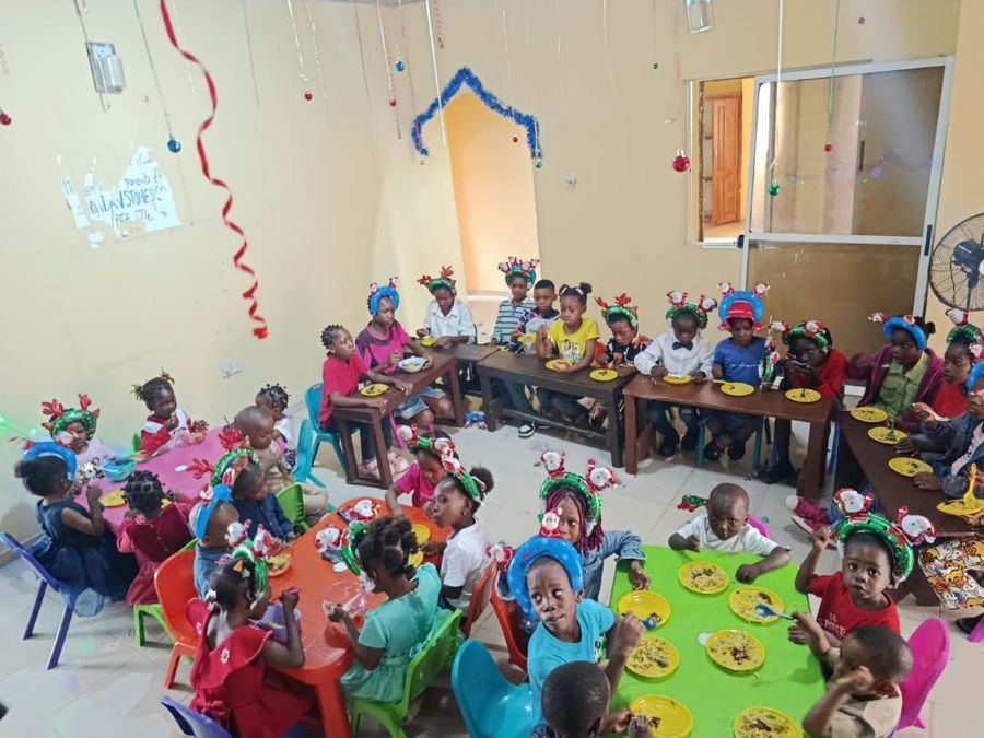 Pupils sharing a meal together at the Christmas party